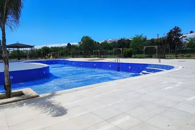 Image de A gated community away from the city noise, with a huge swimming pool