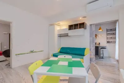 Image de GuestHost - Comfortable and spacious 70 square meters apartment, perfect for four people, located on the first floor of a building (No elevator). The property is located in a residential area within walking distance of various amenities and the main trans