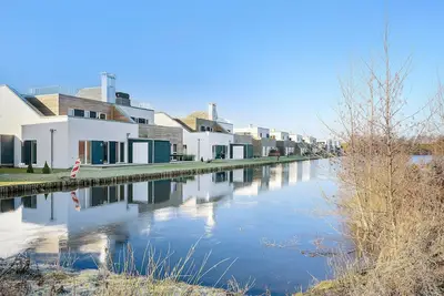 Image de Maison de vacances « Meeresbrise » : vue sur le lac, terrasse privée et Wi-Fi