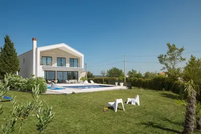 Image de Villa Mariva for 8 persons near Poreč with 44 m2 heated pool, sea view, fitness & kids playground