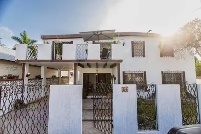 Image de Casa 10 min del consulado americano WiFi 500 Mbps