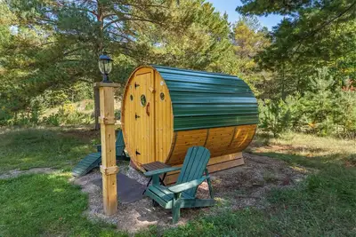 Image de Modern Lakefront Home in Sugar Camp, Cedar Sauna + 1/8 mi to Snowmobile Trails