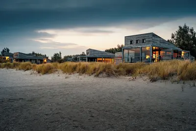 Image de The 4-person Villa Super Vip features a luxurious and comfortably furnished interior with a direct waterfront location, various terraces offering unobstructed views over the water.