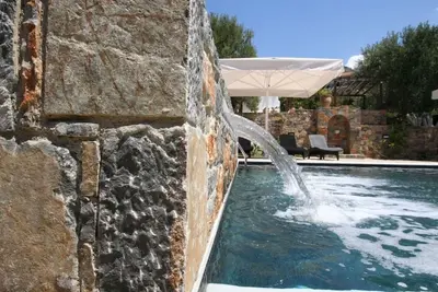 Image de Wohnung mit Pool im Blumenparadies by Interhome
