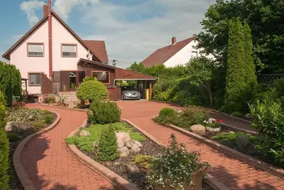 Image de Wohnung mit Garten, Grill und Gemeinschaftspool by Interhome