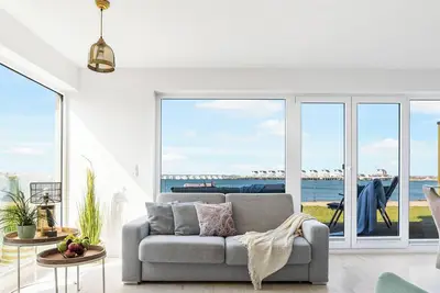 Image de DreamLounge - First row on the water, infrared cabin, whirlpool tub, terrace