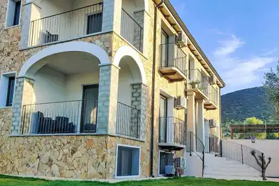 Image de Suite Wohnungen i4mori Porto Pino by Interhome
