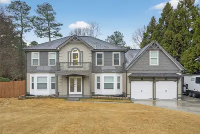 Image de Mall of Ga, Cozy 5 Bedrooms Gateway, Sleep 12 + Game Room and Wi-Fi