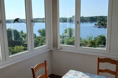 Image de Vacation apartment \"Inselblick\" with waterfront property, lake view and boat mooring