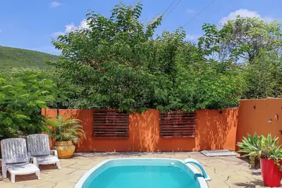 Image de Suite em Pousada em Rio Grande com Piscina