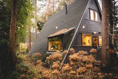 Image de Would you like to rent a holiday home or bungalow in Lanaken/Rekem, near Maastricht (Limburg)? Then book Boshuisje Tanuki!