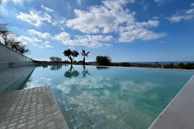 Image de 5-bedroom villa in peaceful Mġarr Malta with pool, hot tub, views & gardens