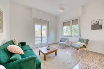 Image de GuestHost - Cozy 77 sqm apartment, perfect for up to 4 people, located on the third floor of a building without an elevator. The property is located in a residential neighborhood of Perugia, well-served and equipped with all major amenities. Its strategic