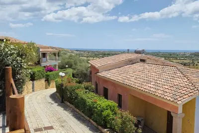 Image de Appartement 'Jej Budoni Loc Colle' avec vue mer, terrasse privée et climatisation