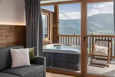 Image de Appartement 'Dilia Chalet Mountain' avec vue sur le lac, piscine et Wi-Fi