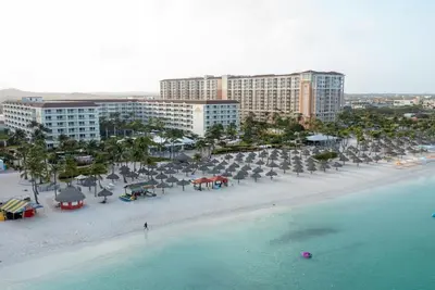 Image de Aruba Ocean-Side 1br at Surf Club – Full Kitchen, Balcony & Palm Beach Bliss