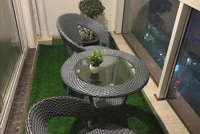 Image de Premium Studio Retreat at Spectrum Mall | Private Balcony & City Views