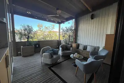 Image de Sublime appartement 2 chambres avec terrasse couverte arborée