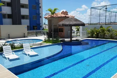 Image de Apartment near the beach. Blue Village Residence. Balcony with barbecue grill.
