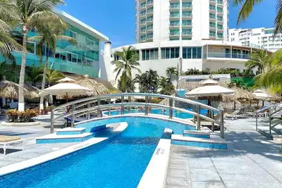 Image de Suite in condominium with beautiful ocean view, private beach access and amenities