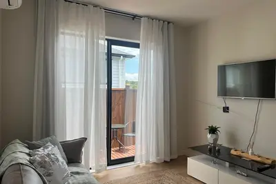 Image de 2-bedroom house in perfect Orewa with cool Ac and charm