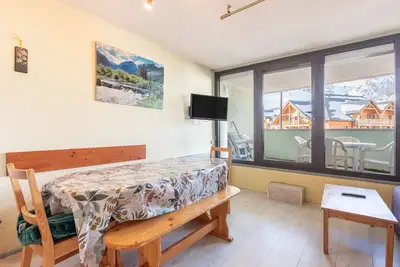 Image de Appartement 'Mongie Hebdo' avec vue sur la montagne et balcon