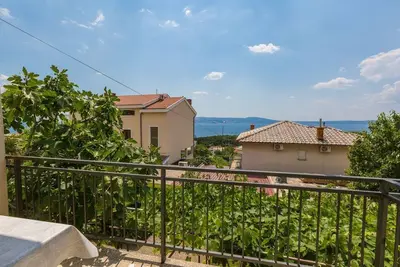 Image de Charmant appartement à seulement 650 mètres de la plage avec vue sur la mer, espace barbecue, parking privé