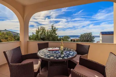 Image de Charmant appartement à seulement 390 mètres de la plage avec vue sur la mer, lave-linge