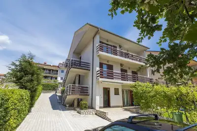 Image de Appartement confortable avec vue sur la mer, parking privé, jardin, climatisation, WiFi