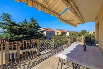 Image de Appartement lumineux à seulement 450 mètres de la plage avec espace barbecue - chiens bienvenus