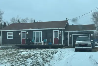 Image de With a view of the famous Miramichi River. . . . Come stay at  Poppy Jacks place. .