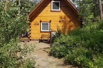 Custom Built Log Cabin Bordered by Black Hills National Forest