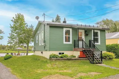 Image de Chalet bord de l'eau avec spa - Le Quaitude