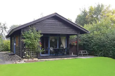 Image de Log cabin with fiber optic W-Lan near the beach - Log cabin