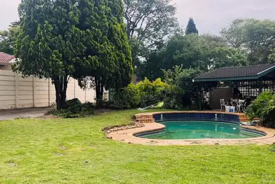 Image de Enjoyable 3-bed house in a nice neighbourhood covered by lushy trees - Randburg.