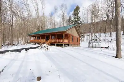 Image de Charming 3-bedroom Log Cabin in Hamilton perfect for your getaway