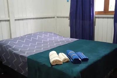 Image de Cozy wooden house, quiet location, 5 minutes drive to the beach.