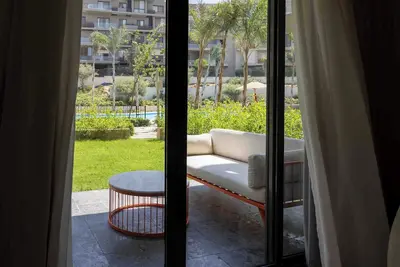 Image de Chic 2-bedroom apartment with Private Garden + Pool view At Villette