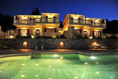 Image de Villa Avgerini Paxos I: Deluxe beachfront apartment with breathtaking sea views