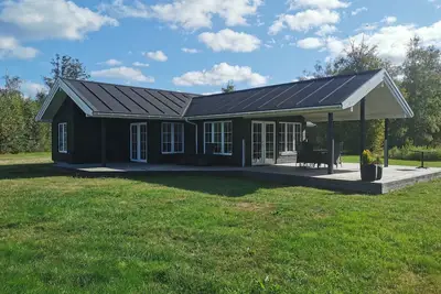 Image de Maison de vacances moderne avec vue partielle sur la mer à Læsø, Danemark