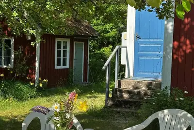 Image de Idyllic country house with rowing boat