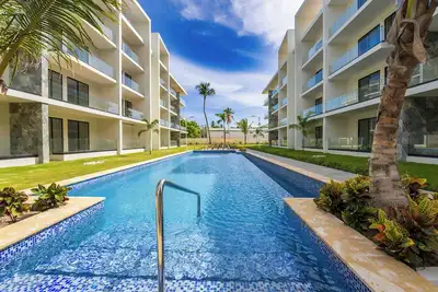 Image de Modern 1br Condo w/ Terrace in Secure Residence, Pool View, Walk to Bávaro Beach