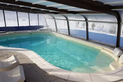 Image de Chalet 15 pers spa sauna billard kota grill piscine chauffée