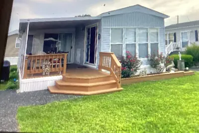 Image de Assateague Pointe Cottage-“Best Location”\nslp 8. Porch. sunrm 2Pools, private pier