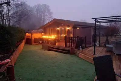 Image de Cabane en rondins de luxe avec bain à remous - York