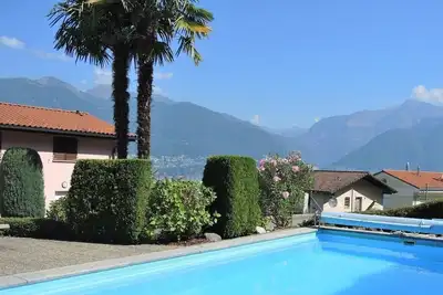 Image de Appartement de vacances adapté aux familles, avec un coin jardin, un grand balco