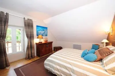 Image de Maison spacieuse et conviviale avec jardin, barbecue et parking privé