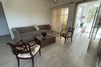 Image de Feel at home 4 min from the Int. las Americas airport and 6 min from the beach.