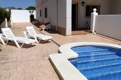 Image de Maison Jumelée avec Piscine Privée et Parking à Miami Platja