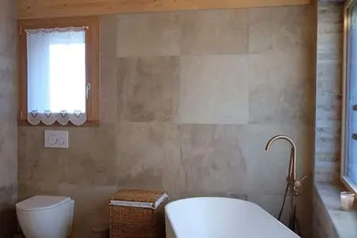 Image de Chalet Iska – Élégance alpine et confort chaleureux avec vue imprenable